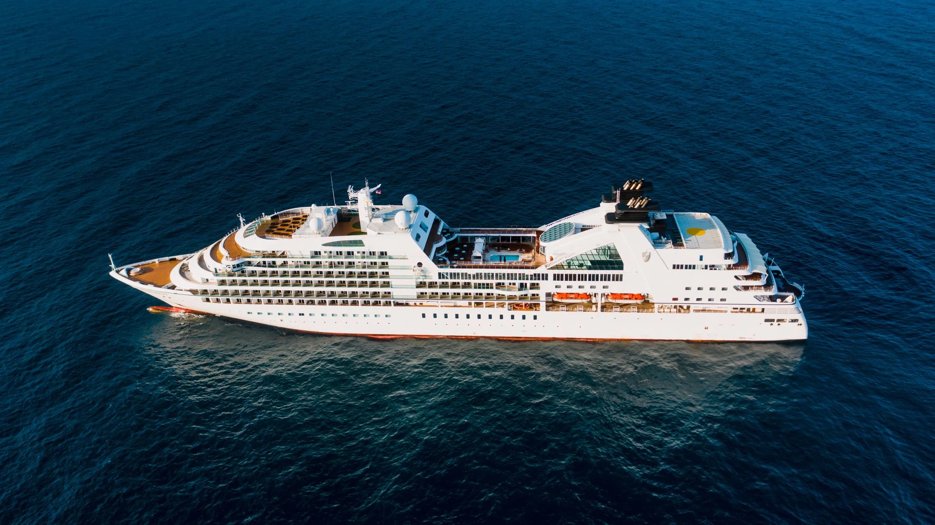 Cruise ship at sea viewed from above