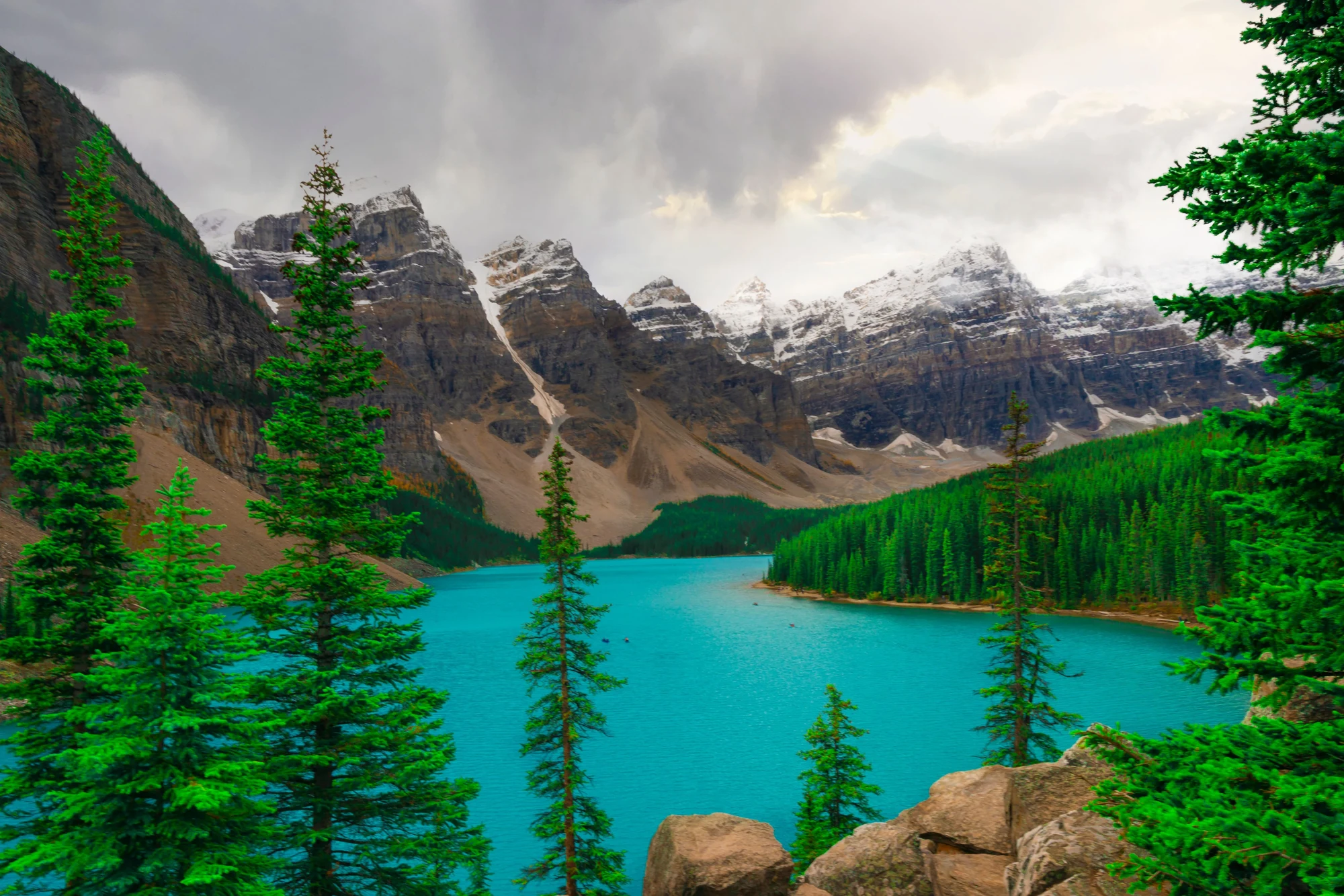 Turquoise alpine lake beneath mountains in Canada